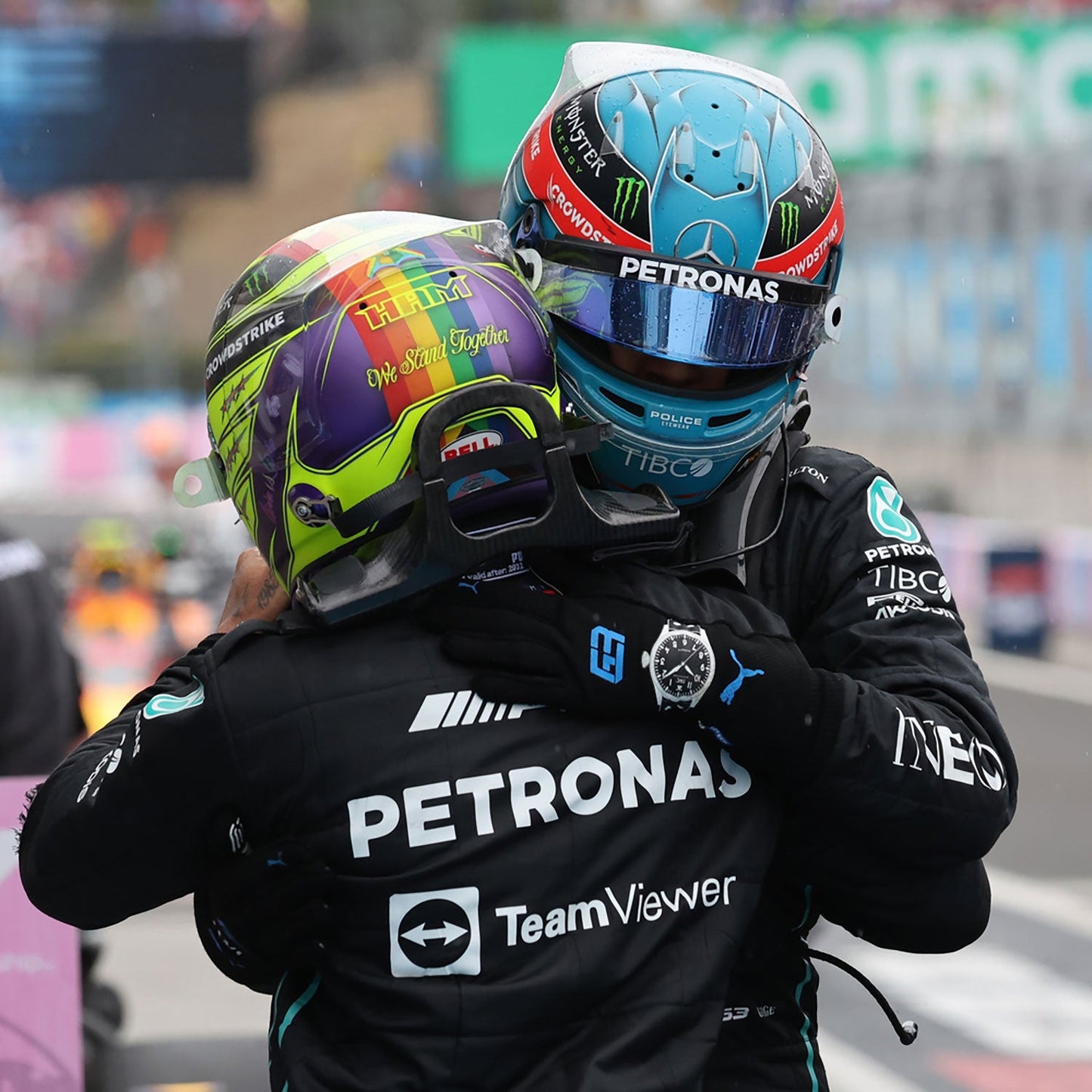 Black George Russell 2022 Mercedes F1 Race Gloves in close-up detail, showing the palm grip pattern used in GP racing conditions
