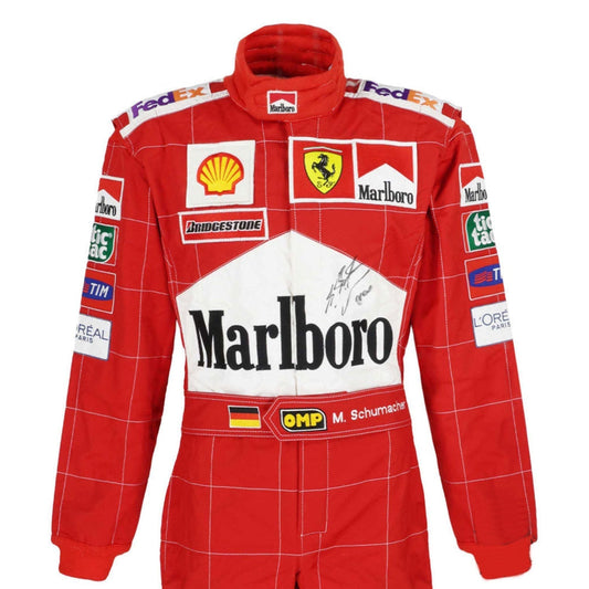 A red long-sleeve Michael Schumacher 2002 F1 Race Costume Ferrari with white grid lines, featuring prominent Marlboro and Ferrari logos, along with sponsor patches including Shell, Bridgestone, FedEx, and Pirelli. The suit is shown against a plain white background.