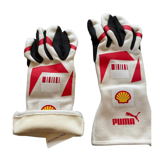 Pair of white Michael Schumacher 2007 Race Gloves F1 Ferrari with red and black accents featuring Puma, Shell, and Schumacher logos Back View