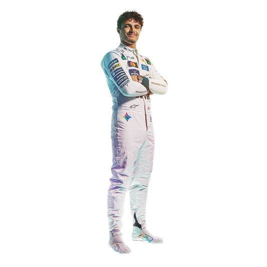 lando norris wearing a white racing suit with multiple sponsor logos stands against a plain white background right view