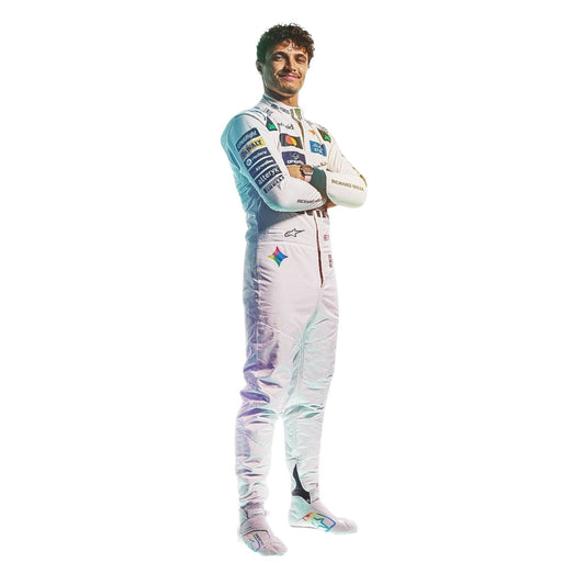 lando norris wearing a white racing suit with multiple sponsor logos stands against a plain white background right view