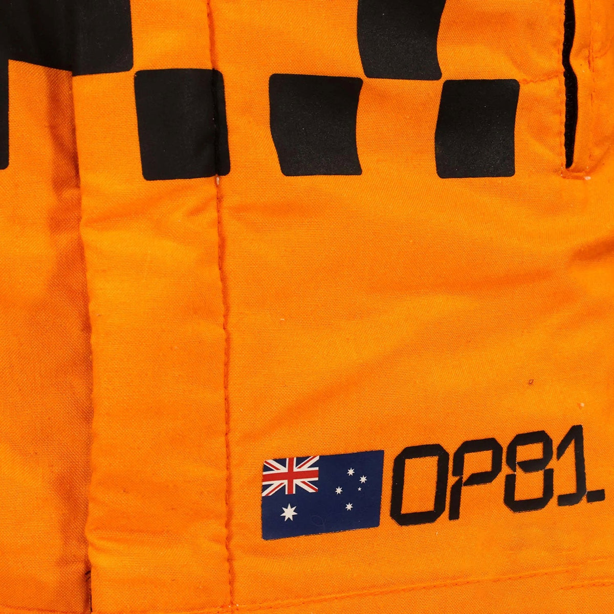 Oscar Piastri F1 Race Replica McLaren Motorsport Suit Close View