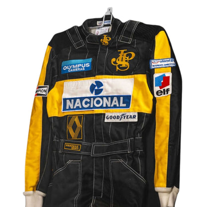 Ayrton Senna 1985 F1 Race Suit Replica Lotus with multiple brand logos on a white background