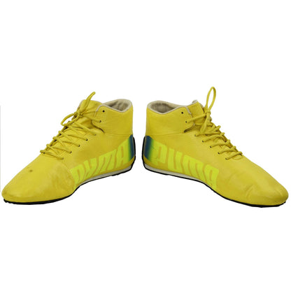 yellow racing shoes for Nico Rosberg supporters, with logo-style graphics across the upper. A neat match for a printed race suit or fan attire.