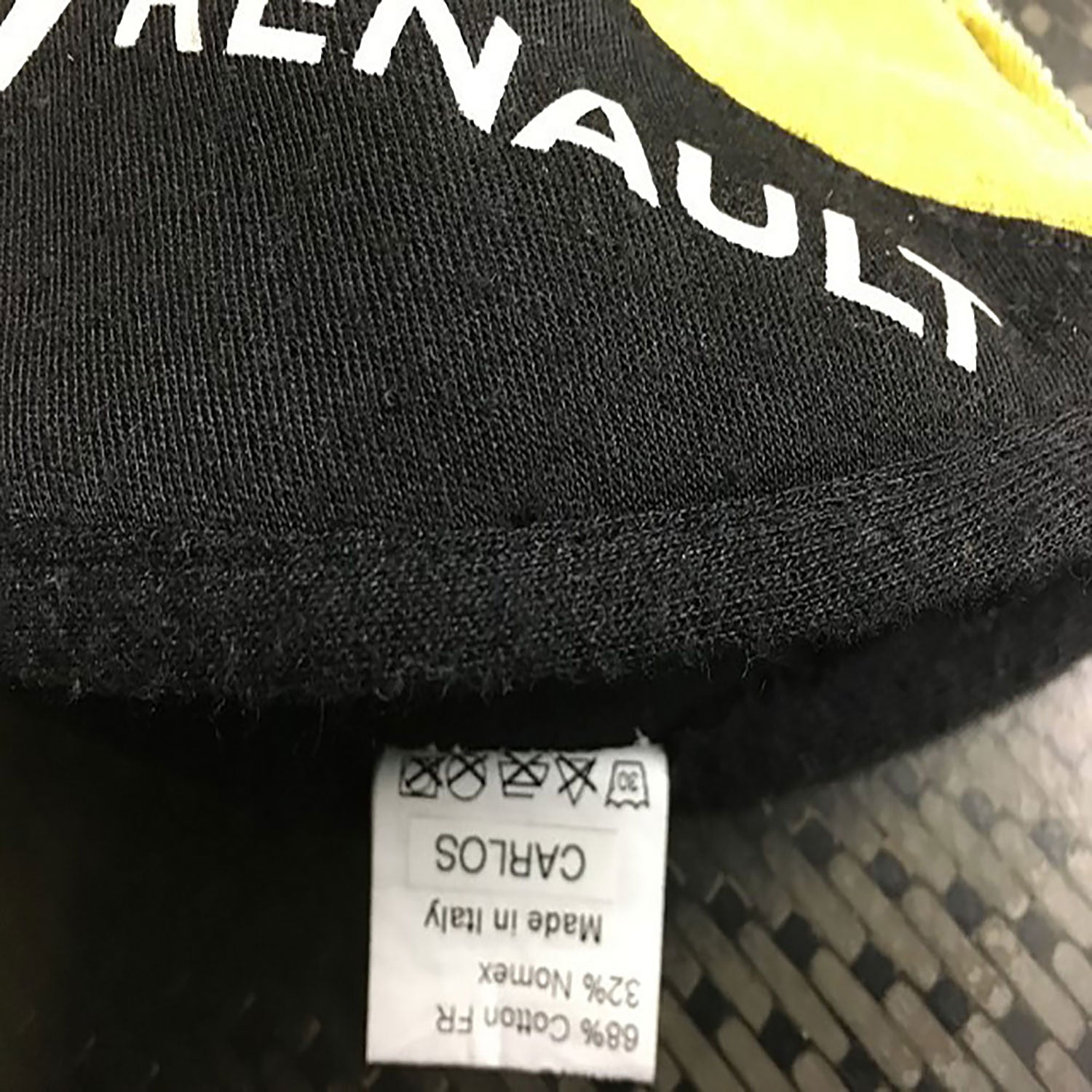 Black Carlos Sainz 2017 Renault F1 Replica Race Gloves in close-up detail, showing the palm grip pattern used in GP racing conditions