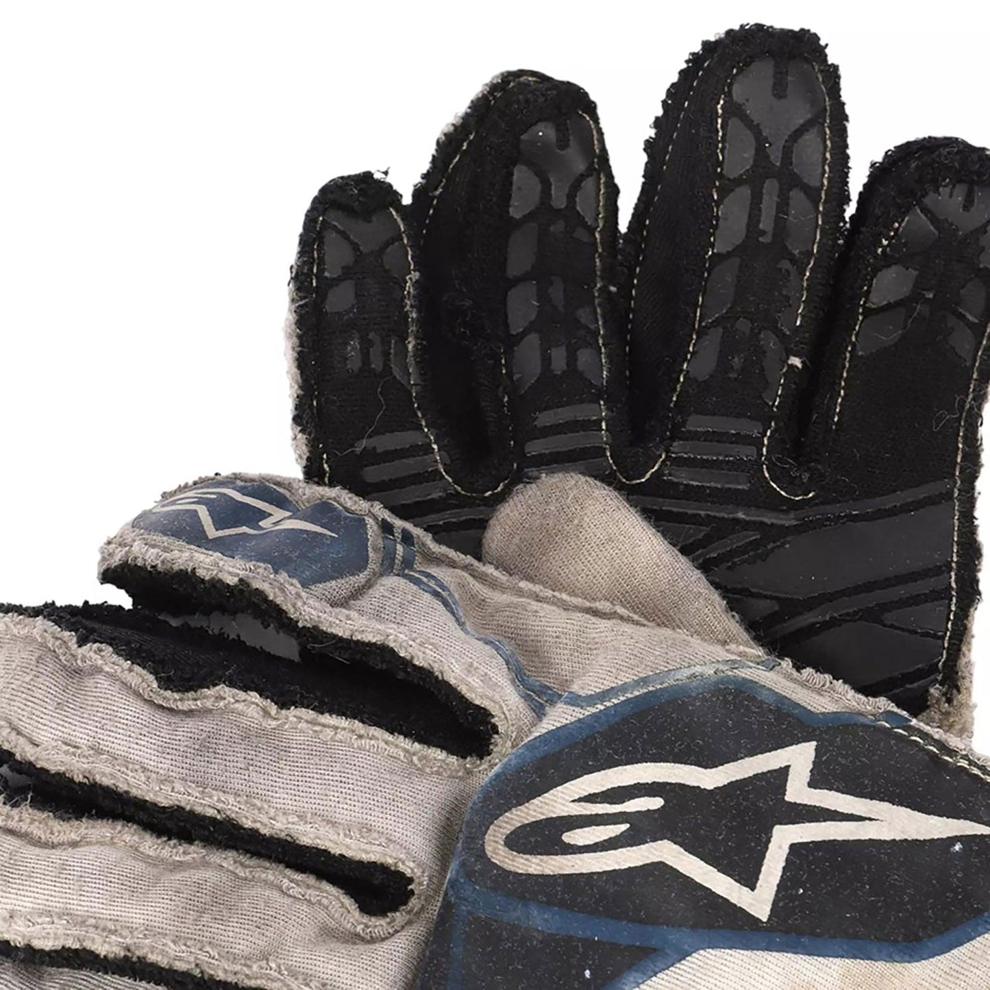 White Lance Stroll 2017 Williams Martini F1 Race Gloves in close-up detail, showing the palm grip pattern used in GP racing conditions