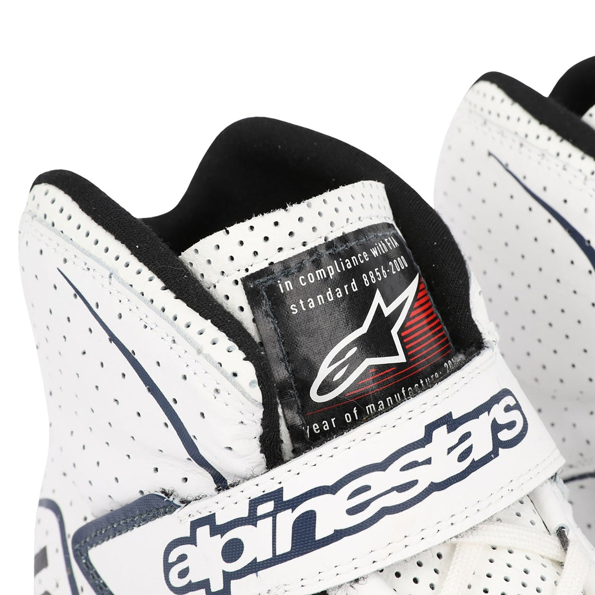 white racing shoes for Lance Stroll supporters, with neat stitching and a sleek racing shape. Everyday racing attire for fans who never switch off.