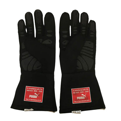 Black Sebastian Vettel 2018 Ferrari F1 Race Gloves shown side-on, highlighting the wrist strap and grip texture for grand prix use
