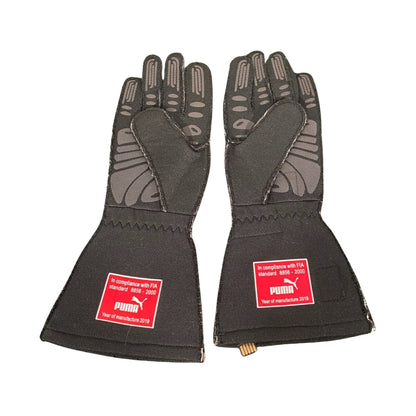 Black Charles Leclerc 2019 Ferrari F1 Race Gloves shown side-on, highlighting the wrist strap and grip texture for grand prix use