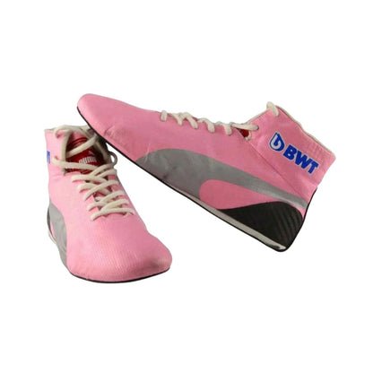 pink racing shoes for Sergio Perez supporters, showing the laced front and padded collar. Everyday racing attire for fans who never switch off.