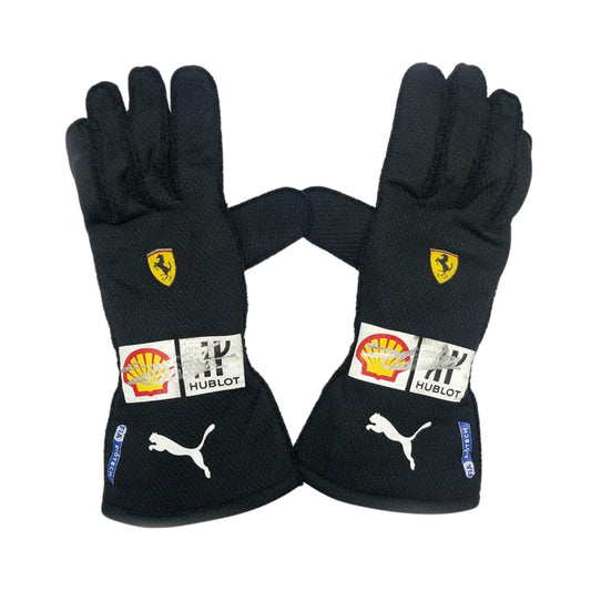 Black Charles Leclerc 2020 Ferrari F1 Race Gloves laid flat, front view, showing the full racing design and replica stitching