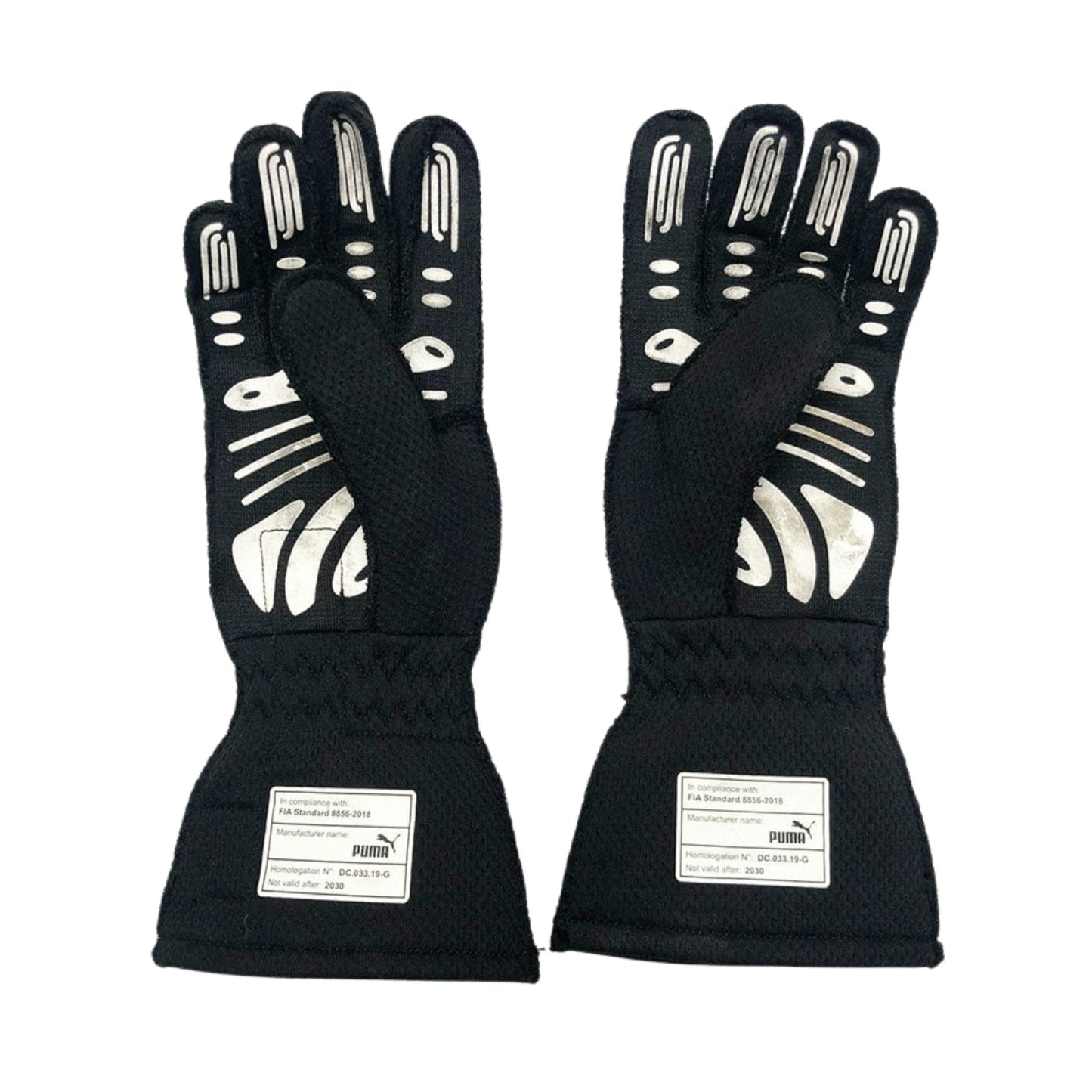 Black Charles Leclerc 2020 Ferrari F1 Race Gloves in close-up detail, showing the palm grip pattern used in GP racing conditions