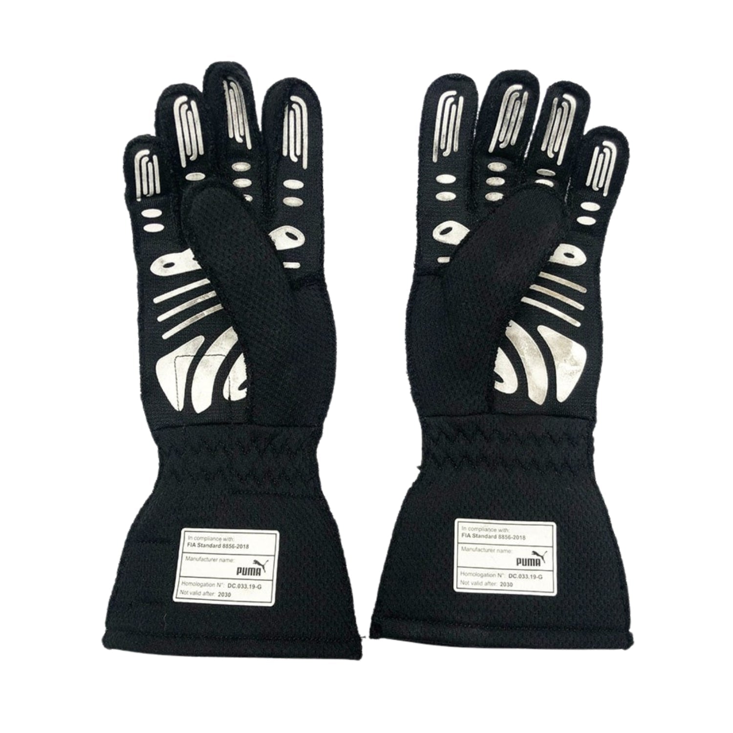 Black Charles Leclerc 2020 Ferrari F1 Race Gloves in close-up detail, showing the palm grip pattern used in GP racing conditions