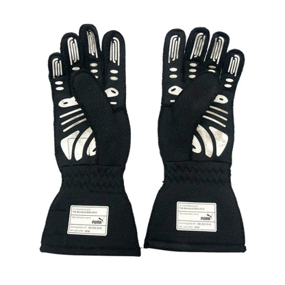 Black Charles Leclerc 2020 Ferrari F1 Race Gloves in close-up detail, showing the palm grip pattern used in GP racing conditions