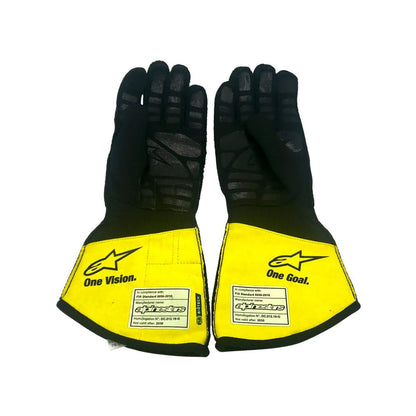 Yellow Daniel Ricciardo 2020 Renault F1 Race Gloves shown side-on, highlighting the wrist strap and grip texture for grand prix use