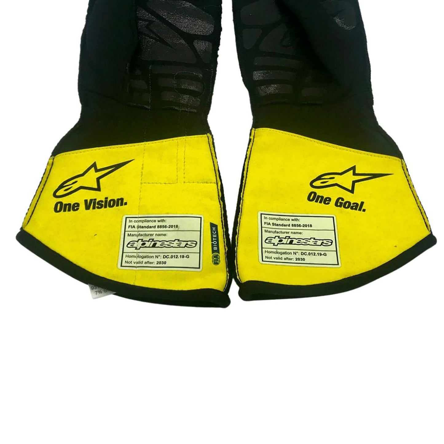 Yellow Daniel Ricciardo 2020 Renault F1 Race Gloves in close-up detail, showing the palm grip pattern used in GP racing conditions