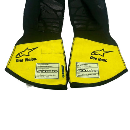 Yellow Daniel Ricciardo 2020 Renault F1 Race Gloves in close-up detail, showing the palm grip pattern used in GP racing conditions