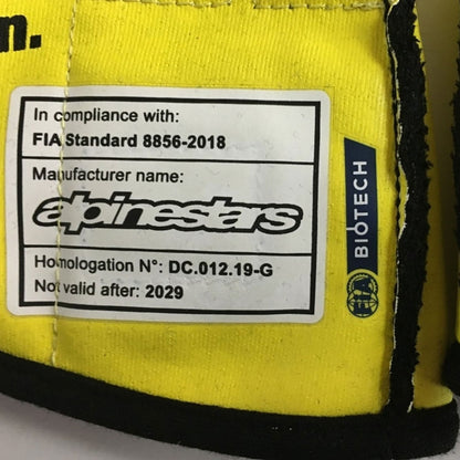 Yellow Esteban Ocon 2020 Renault F1 Race Gloves in close-up detail, showing the palm grip pattern used in GP racing conditions