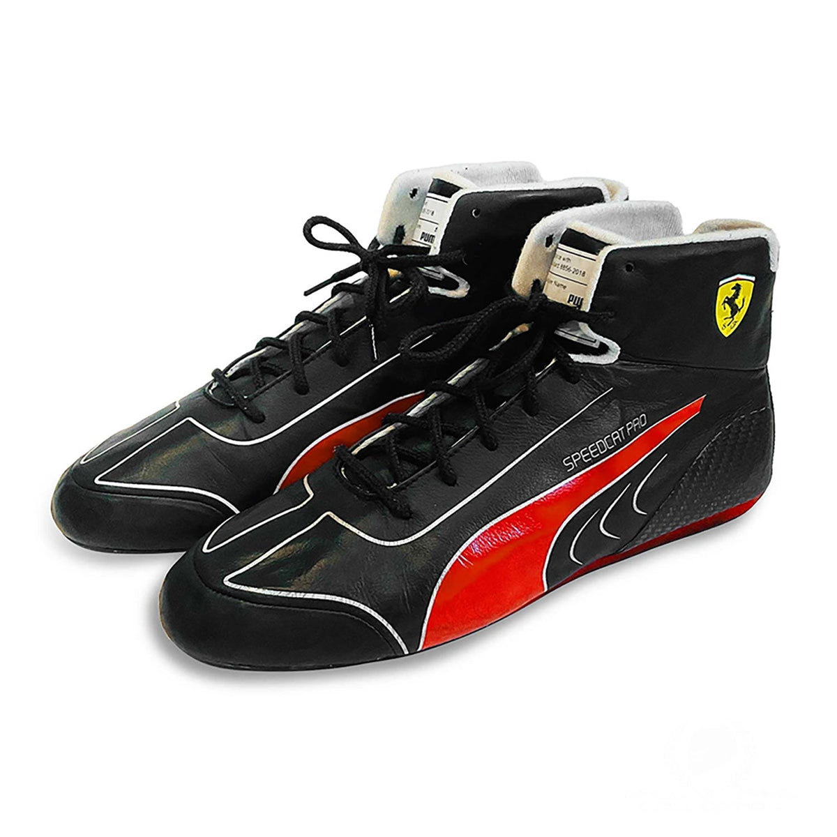 Charles Leclerc 2022 Racing Shoes Replica in red and black, showing the grippy tread and light build. A neat match for a printed race suit or fan attire.