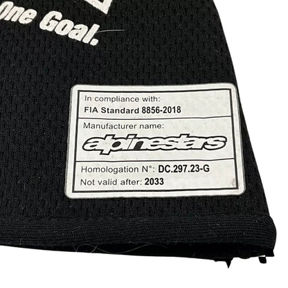 Black Fernando Alonso 2022 Alpine F1 Race Gloves in close-up detail, showing the palm grip pattern used in GP racing conditions