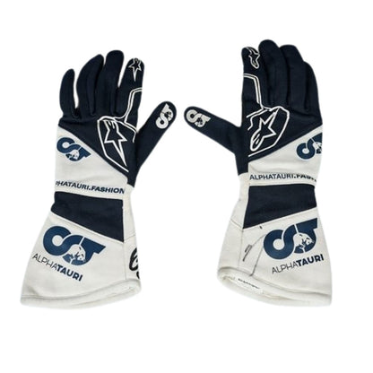 White Daniel Ricciardo 2023 AlphaTauri F1 Replica Race Gloves laid flat, front view, showing the full racing design and replica stitching