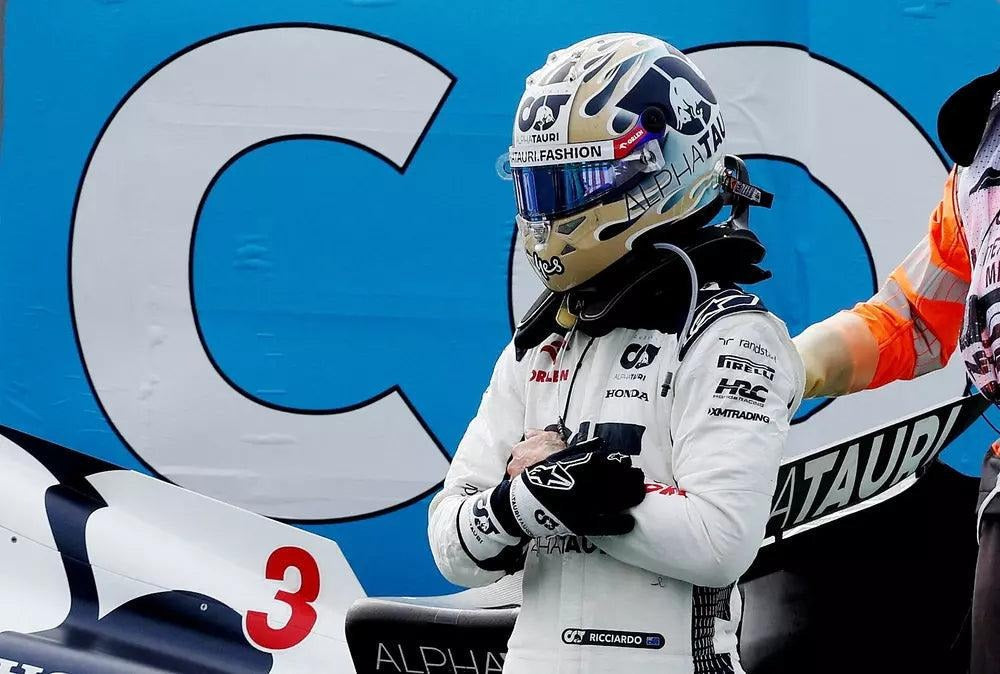 White Daniel Ricciardo 2023 AlphaTauri F1 Replica Race Gloves laid flat, front view, showing the full racing design and replica stitching