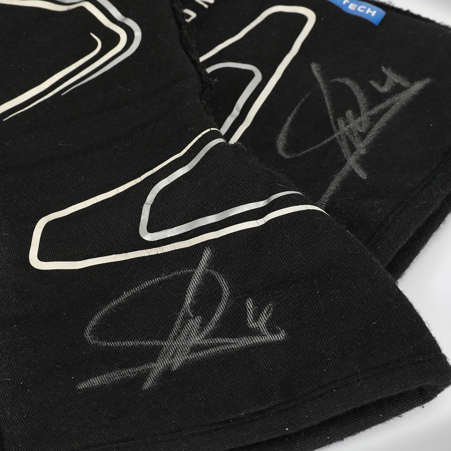 Black Lando Norris 2023 McLaren F1 Race Gloves Replica in close-up detail, showing the palm grip pattern used in GP racing conditions