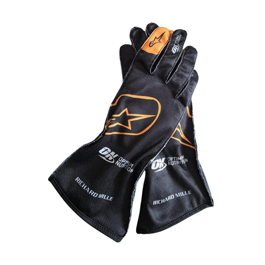 Black Lando Norris 2024 McLaren F1 Replica Race Gloves laid flat, front view, showing the full racing design and replica stitching
