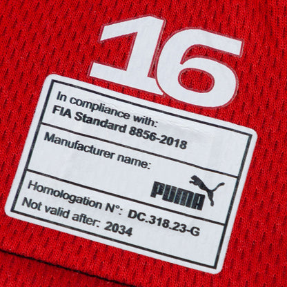 Red Charles Leclerc 2024 Ferrari F1 Race Gloves Replica in close-up detail, showing the palm grip pattern used in GP racing conditions
