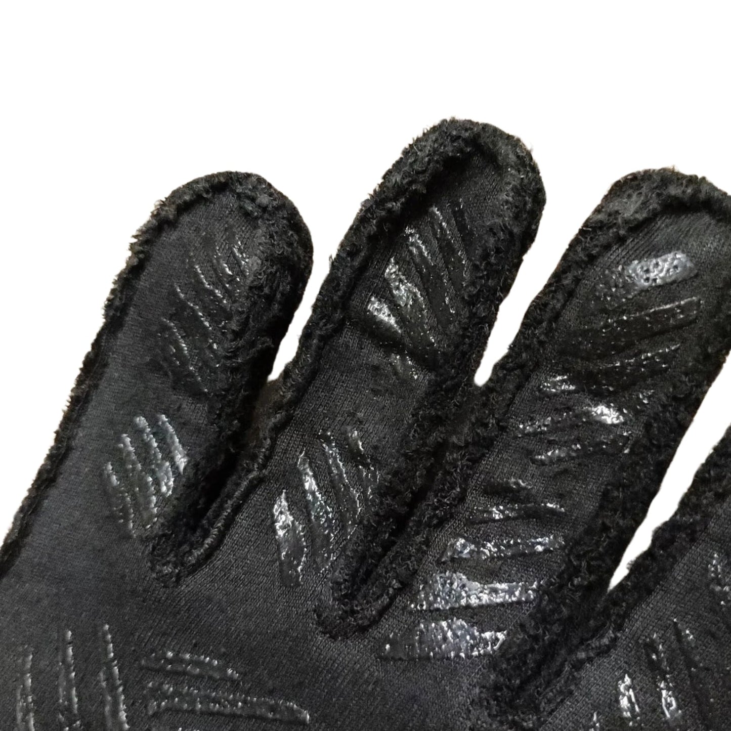 Black Fernando Alonso 2024 Aston Martin F1 Race Gloves in close-up detail, showing the palm grip pattern used in GP racing conditions
