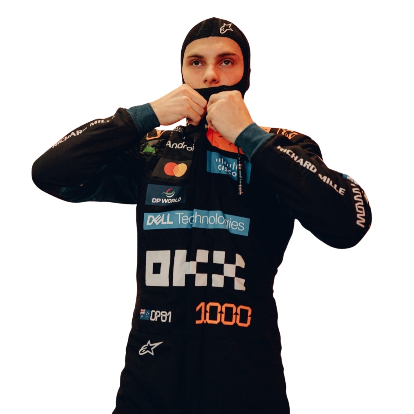 Oscar Piastri wearing a F1 racing suit McLaren Monaco GP with various sponsor logos on a white background Close View
