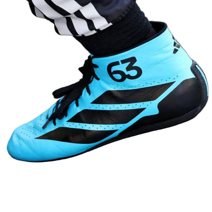 blue fan footwear from the 2026 season, with neat stitching and a sleek racing shape. Comfortable fan shoes for supporters, karters and collectors.
