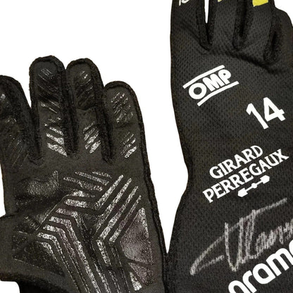 A pair of black Fernando Alonso 2024 Race Gloves F1 Aston Martin shown against a white background, displaying both the textured grip side and the printed side with white text including 'OMP', '14', 'GIRARD PERREGAUX', and a signature.