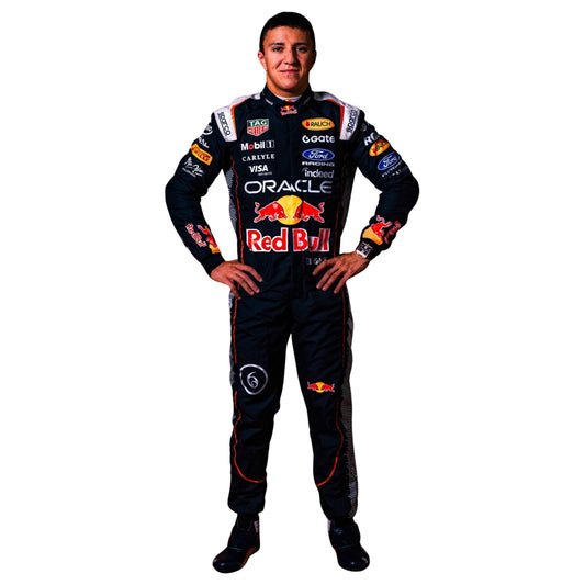 A Isack Hadjar 2026 F1 Race Costume Dutch GP Red Bull with various sponsor logos including Oracle, Mobil 1, Castor, and Ford, standing with hands on hips against a plain white background.