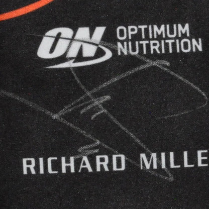 Optimum Nutrition logo on a black Lando Norris 2025 Race Gloves F1 McLaren with 'Richard Mille' text.