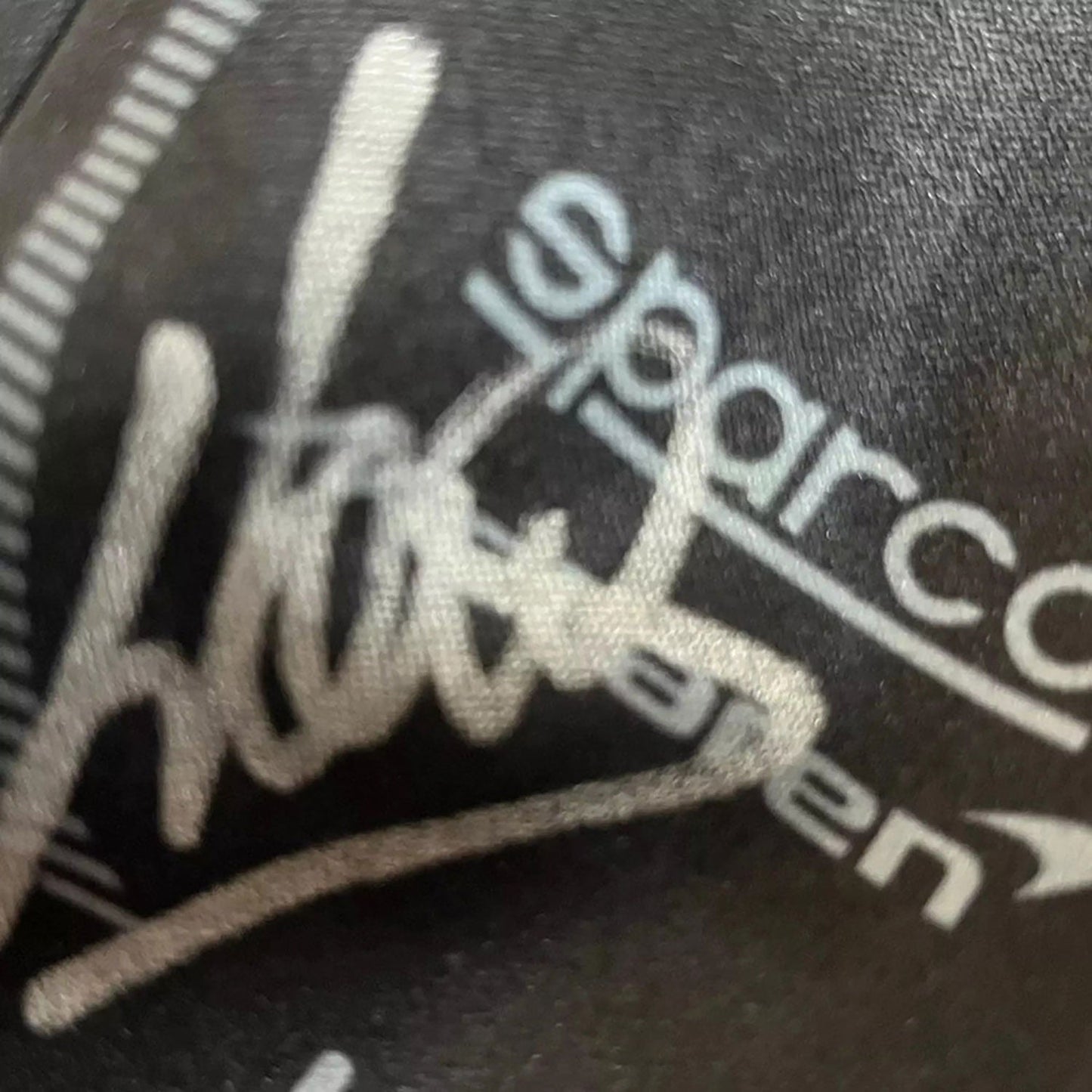 Black Lando Norris Race Gloves F1 in close-up detail, showing the palm grip pattern used in GP racing conditions