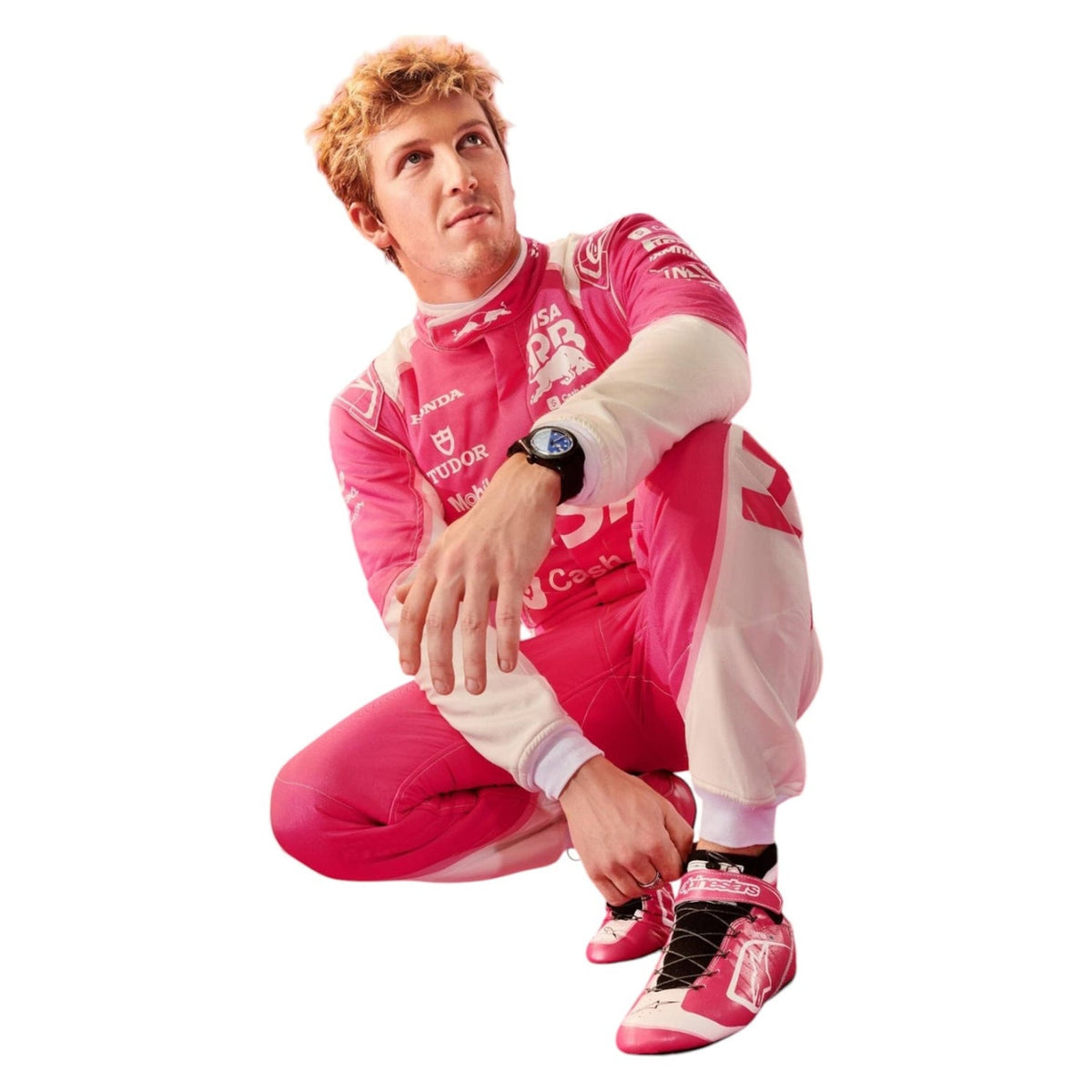 Liam Lawson 2025 F1 Race Suit VCARB Miami GP crouching, wearing pink and white racing shoes with black laces.
