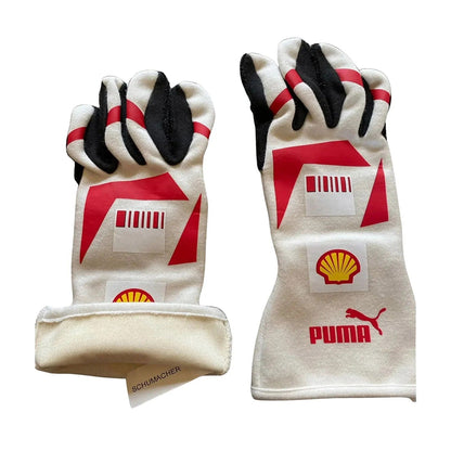 Pair of white Michael Schumacher 2007 Race Gloves F1 Ferrari with red and black accents featuring Puma, Shell, and Schumacher logos Back View