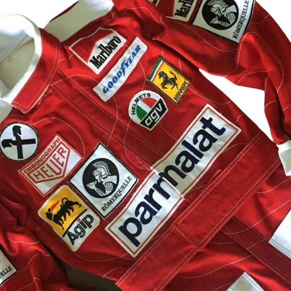 Red Niki Lauda 1976 F1 Race Suit Ferrari with various sponsor logos Close Up View