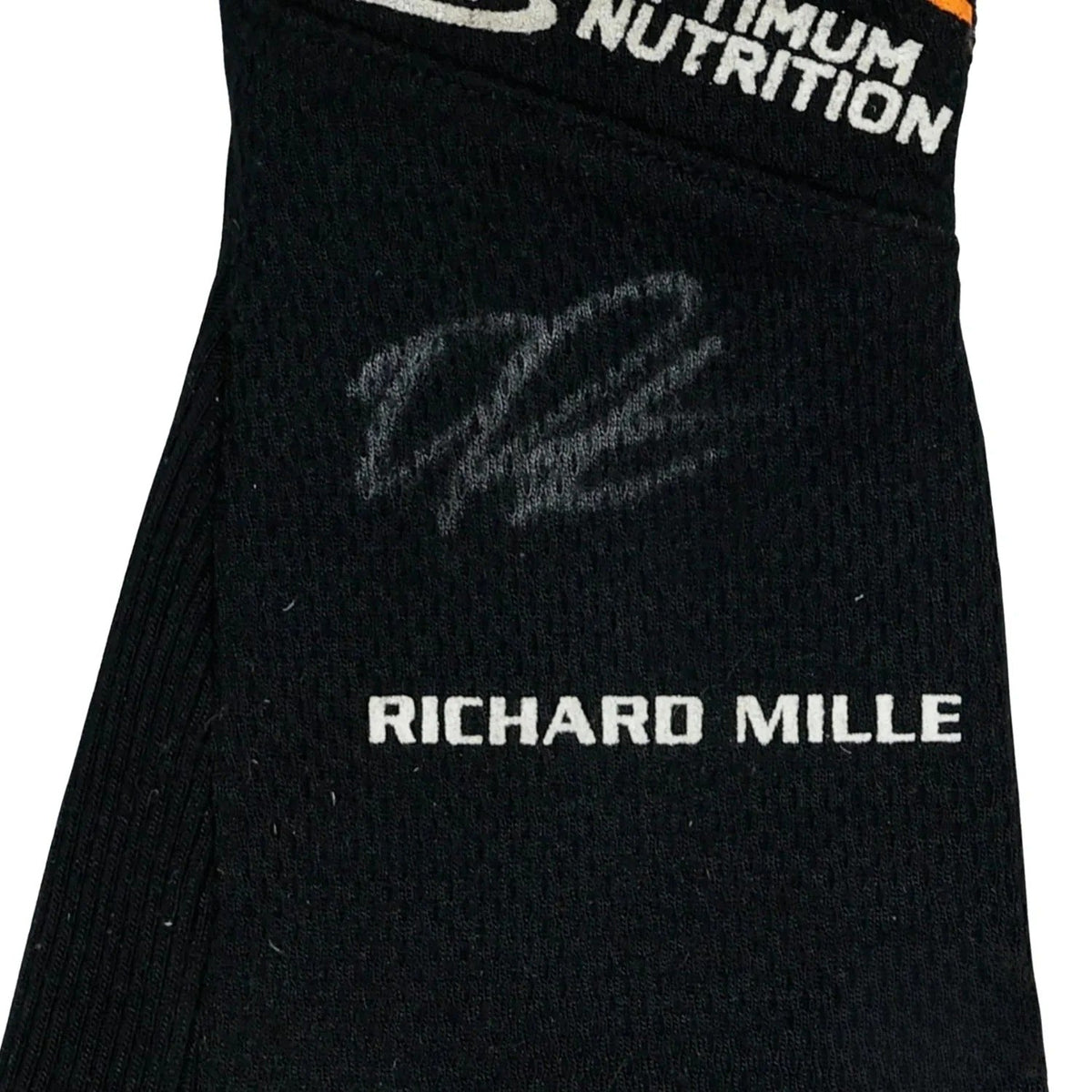 Black Oscar Piastri 2024 Race Gloves F1 McLaren with 'Richard Mille' and 'Maximum Nutrition' branding close up view