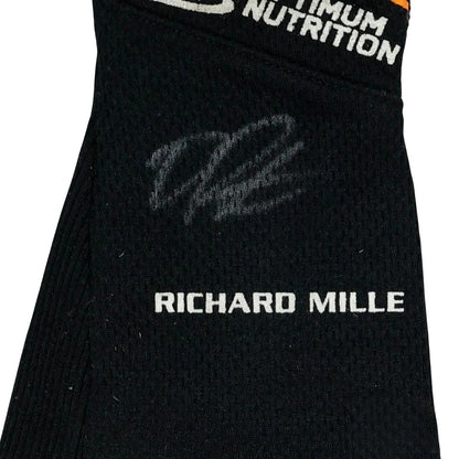 Black Oscar Piastri 2024 Race Gloves F1 McLaren with 'Richard Mille' and 'Maximum Nutrition' branding close up view