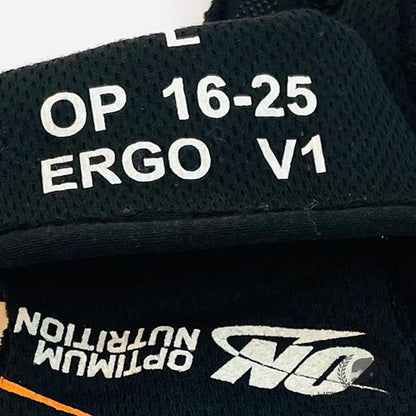 Close-up of a black Oscar Piastri 2025 Replica Race Gloves F1 McLaren with white printed text reading 'OP 16-25 ERGO V1' and a visible 'Optimum Nutrition' logo.