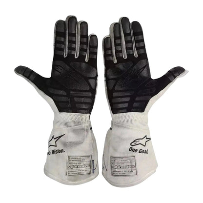 A pair of Alpinestars Pierre Gasly 2020 Race Gloves Replica F1 AlphaTauri shown flat against a white background, displaying the black textured palms and white backs with the Alpinestars logo and 'One Goal' text.