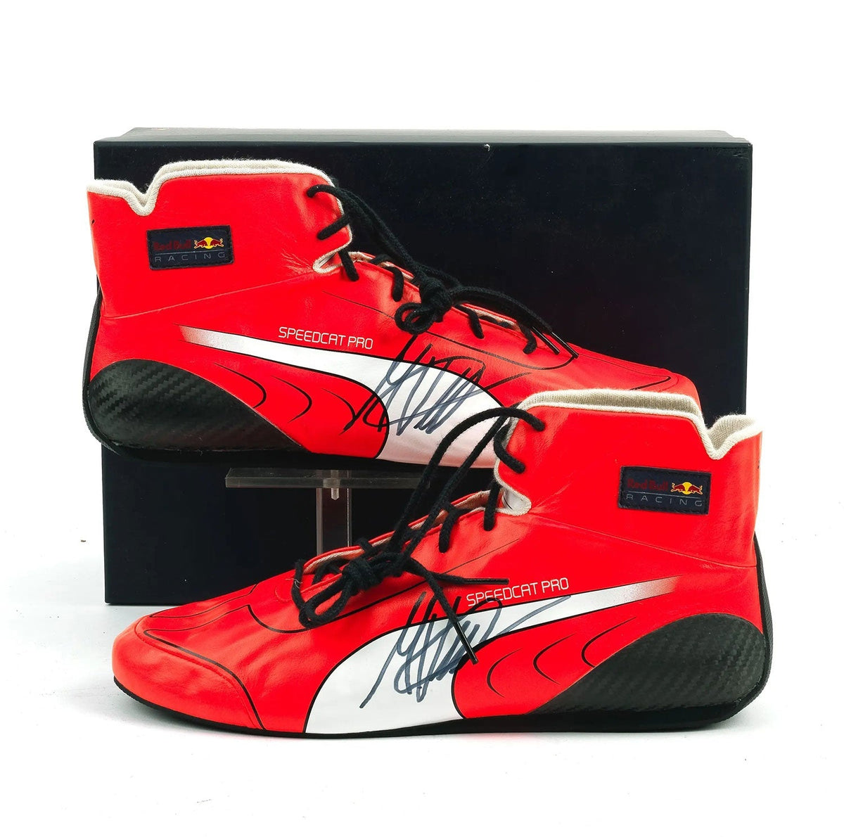 Red F1 Racing Shoes Replica in red, with logo-style graphics across the upper. A sporty finish for a cosplay outfit or a circuit visit.