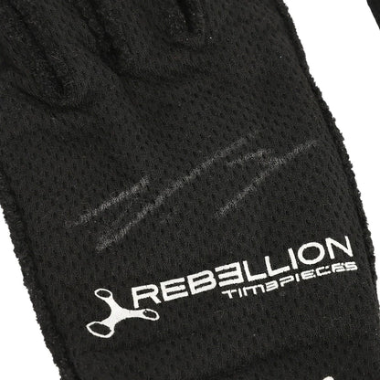Close-up of a Valtteri Bottas 2022 British GP Race Gloves F1 Mercedes with a white printed logo and the text 'REBELLION TIMEPIECES' on the back of the hand.
