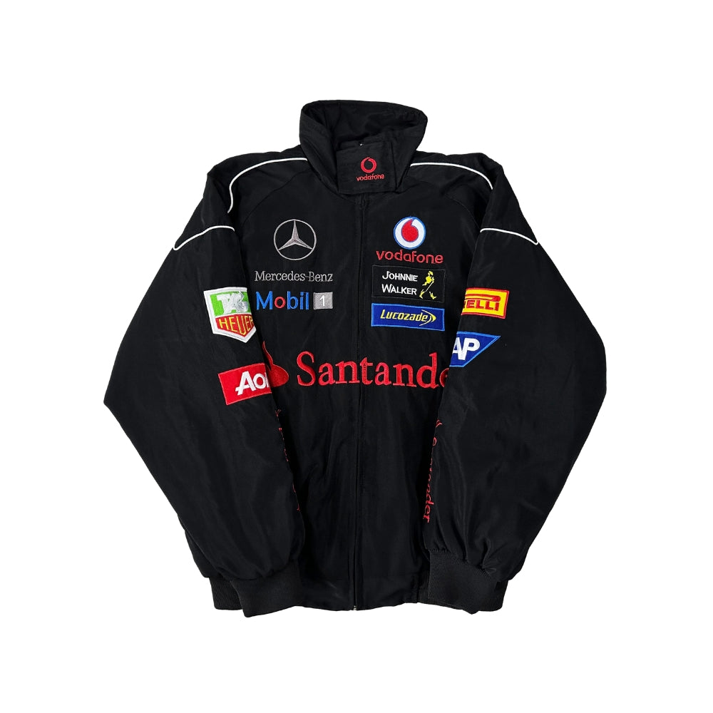Mercedes Benz Embroidered F1 Retro Jacket in retro Mercedes styling, showing the embroidered chest badge and ribbed collar. Old-school racing style for everyday wear.
